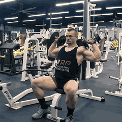 Seated dumbbell shoulder press demonstration